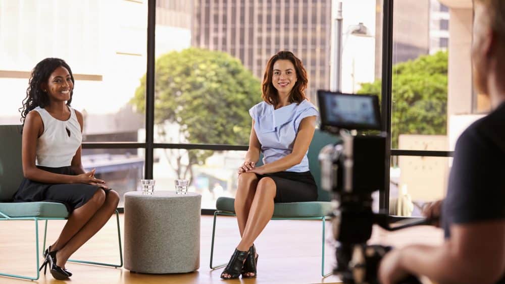 young women having presenter training to be confident on camera