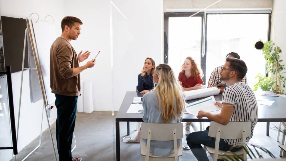 business professional using presentation skills training to sell new product