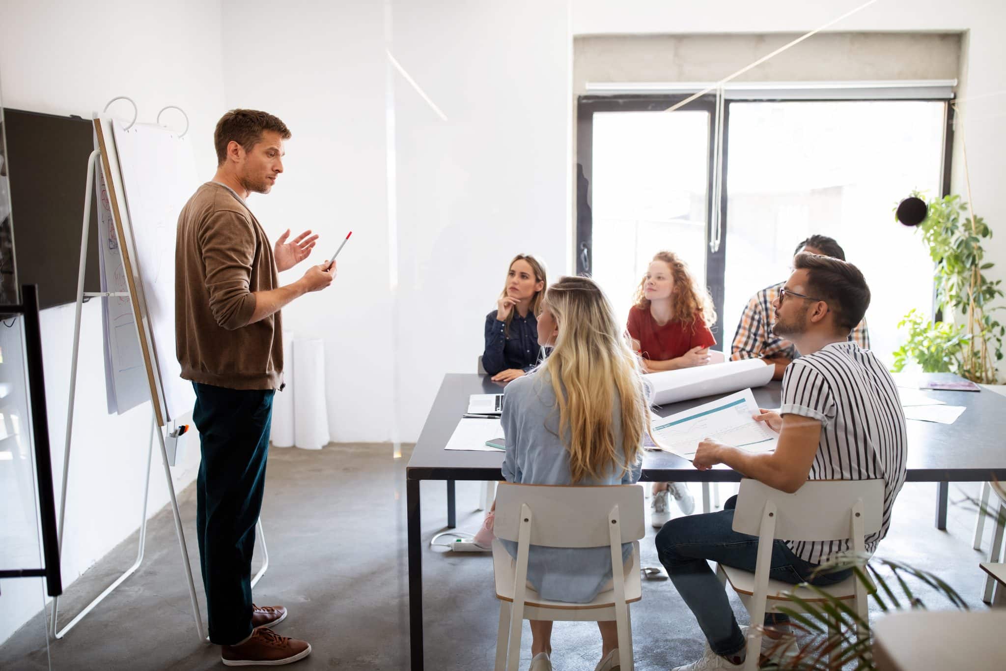 business professional using presentation skills training to sell new product